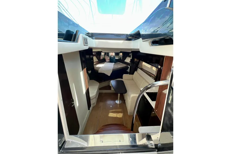 Slide: The Image of Interior of 2017 Sea Ray Sundancer 350 Coupe, featuring elegant seating and modern design. - 81