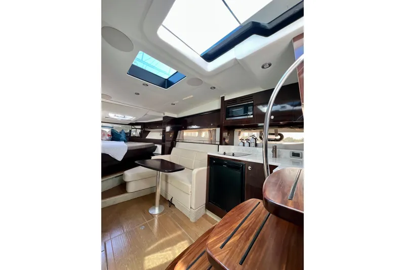 Slide: The Image of Luxurious interior of 2017 Sea Ray Sundancer 350 Coupe with modern amenities and elegant design. - 94