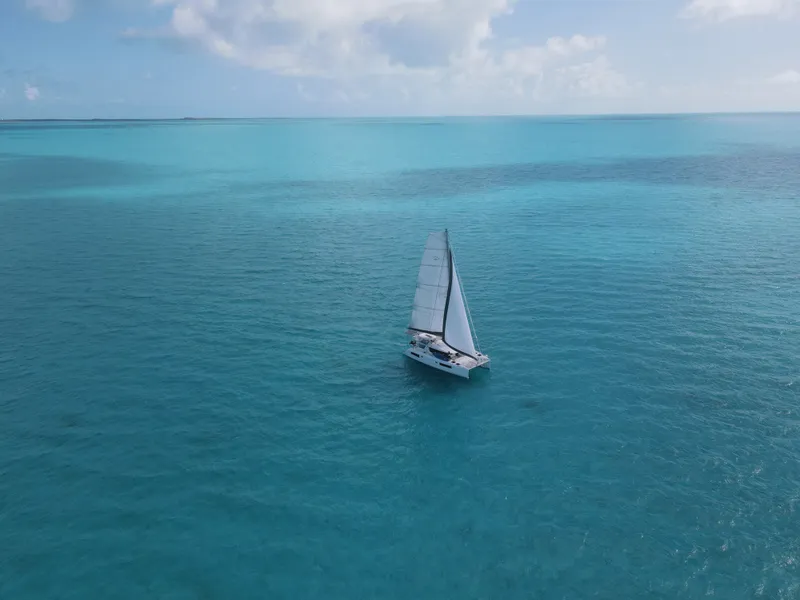 The Image of Leopard 45 catamaran sailing on turquoise sea, 2021 model. - 0