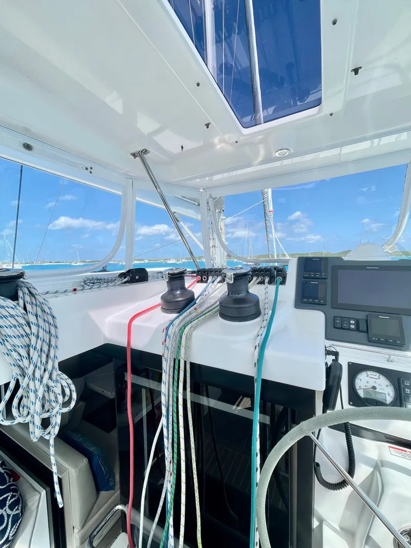 Slide: The Image of Interior view of a Leopard 45 yacht with controls and ropes. - 13
