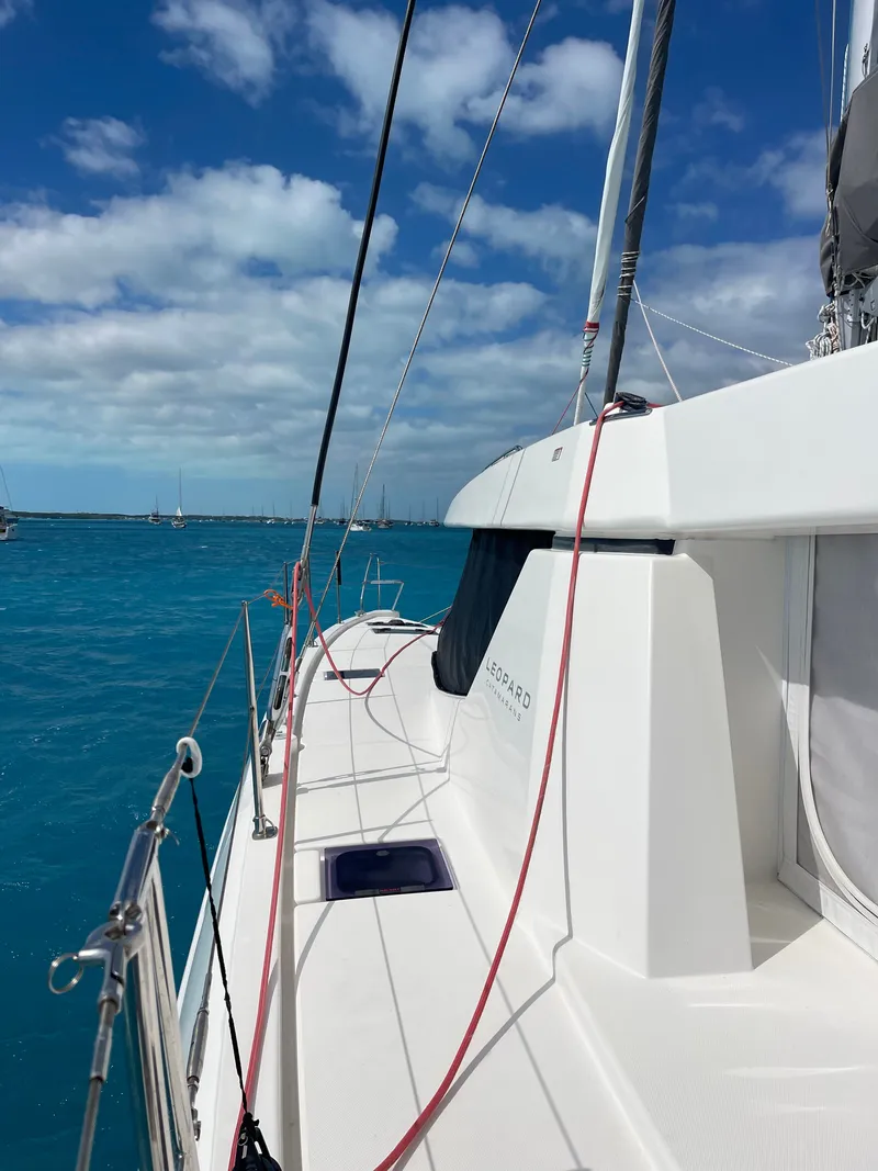 Slide: The Image of Leopard 45 sailboat on blue sea under clear sky. - 2