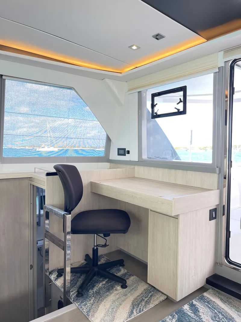 Slide: The Image of Interior of a 2021 Leopard 45 yacht with desk and chair. - 24