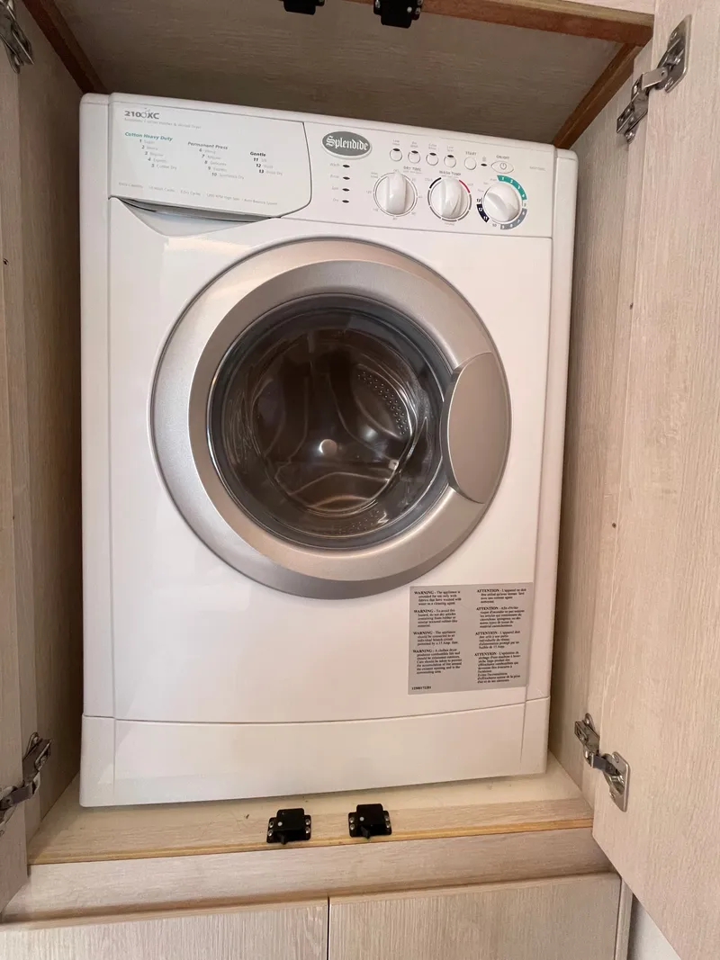 Slide: The Image of Washing machine in wooden cabinet, Leopard 45, 2021 model. - 31