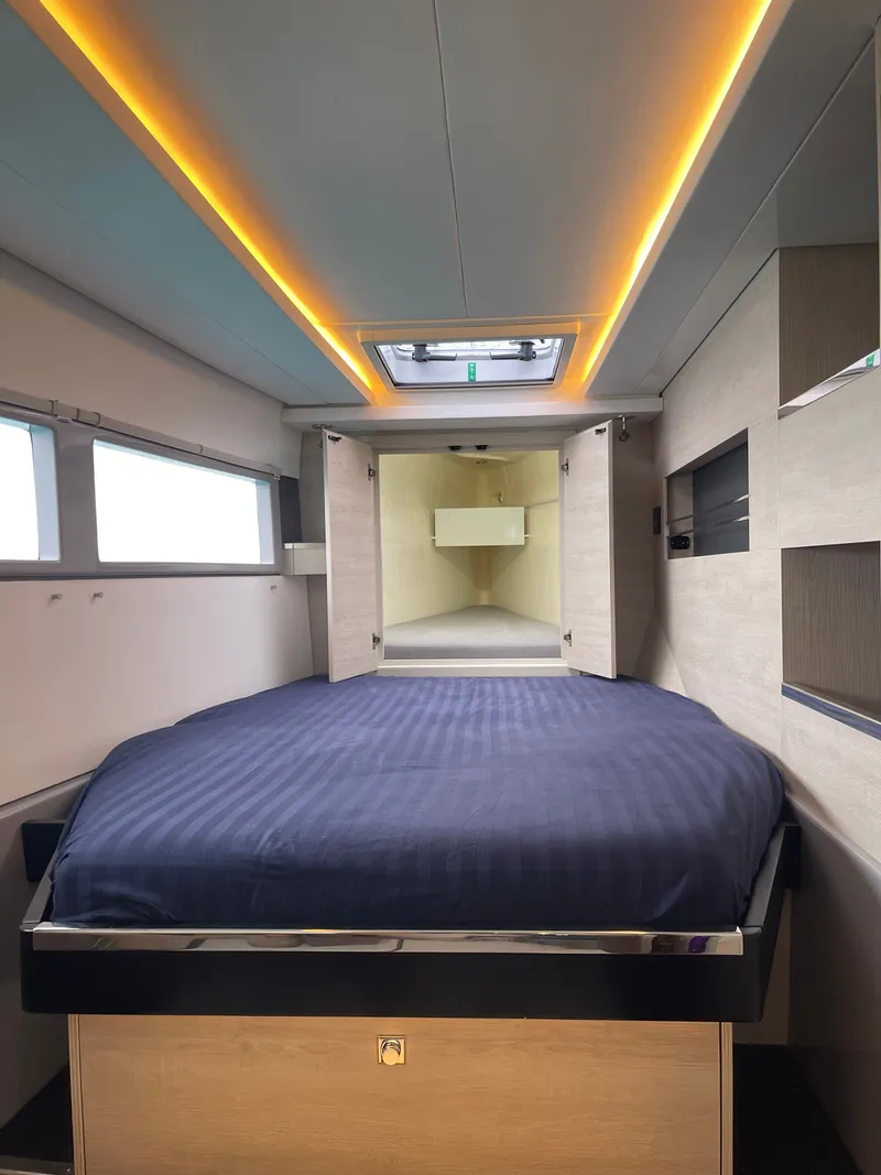 Slide: The Image of Interior of a Leopard 45 yacht featuring a modern bedroom design. - 36