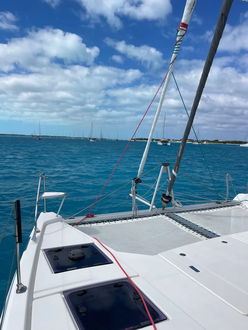 Slide: The Image of Leopard 45 catamaran sailing on blue sea, 2021 model. - 4