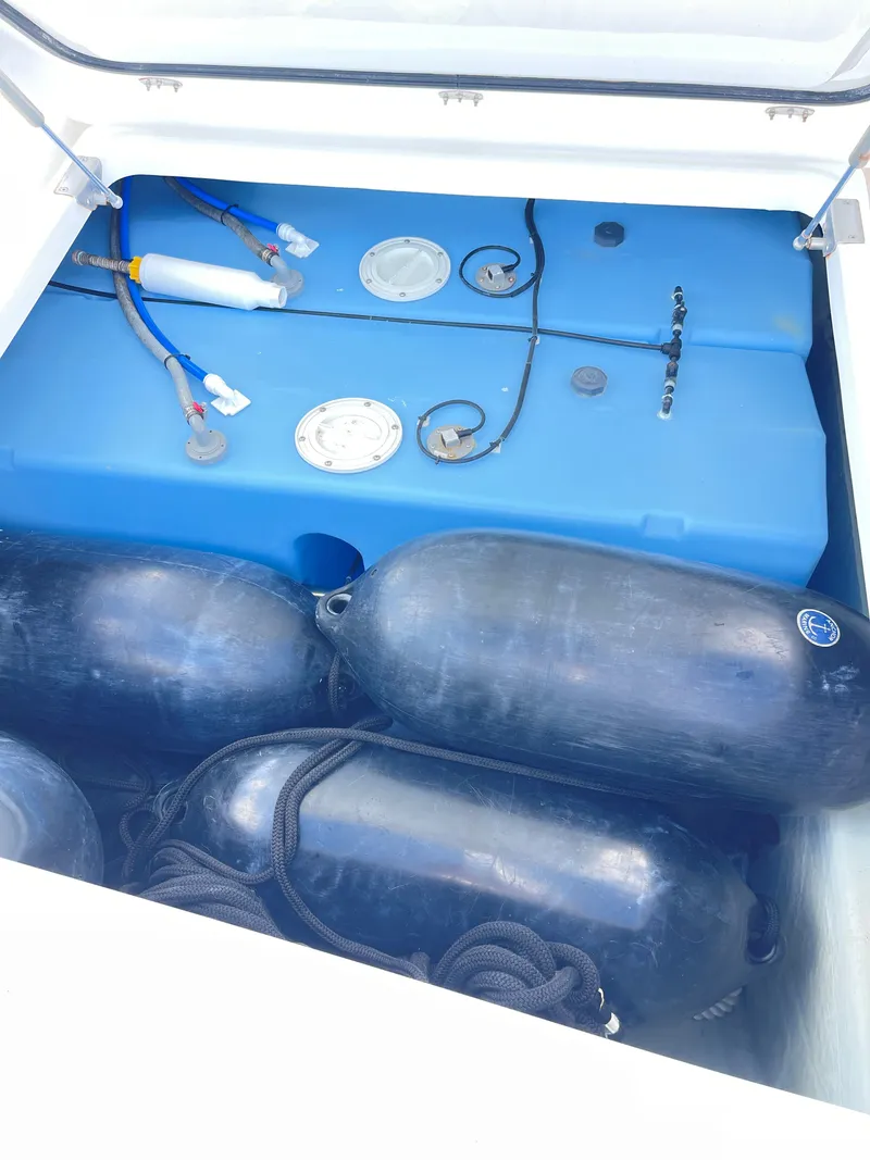 Slide: The Image of Leopard 45 boat 2021 with blue water tanks and fenders. - 41