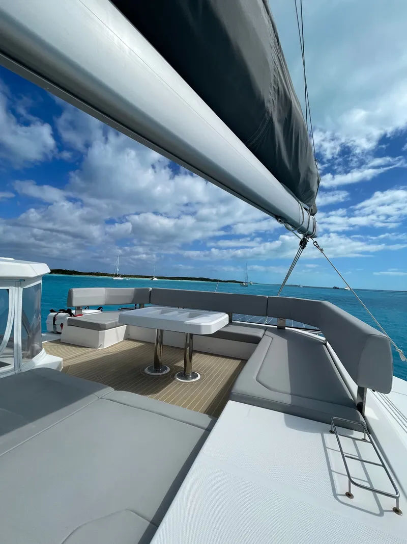 Slide: The Image of Leopard 45 catamaran 2021 on blue sea with sun deck. - 8