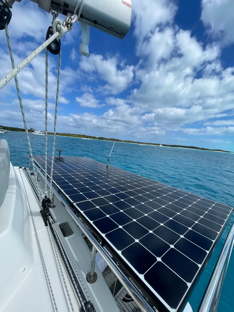 Slide: The Image of Leopard 45 catamaran with solar panel on blue sea, 2021. - 9
