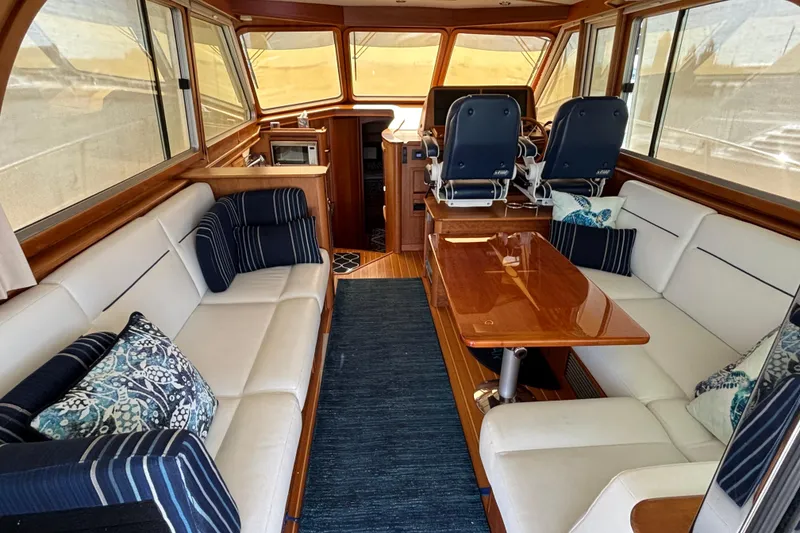 Slide: The Image of Luxurious interior of 2019 Sabre 45 Salon Express yacht with elegant seating and wooden finishes. - 15