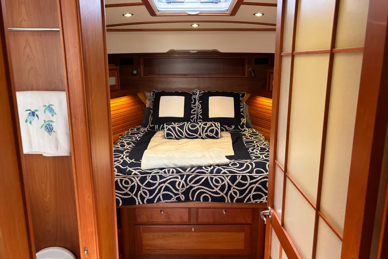 Slide: The Image of Luxurious cabin interior of 2019 Sabre 45 Salon Express yacht with elegant bedding. - 27