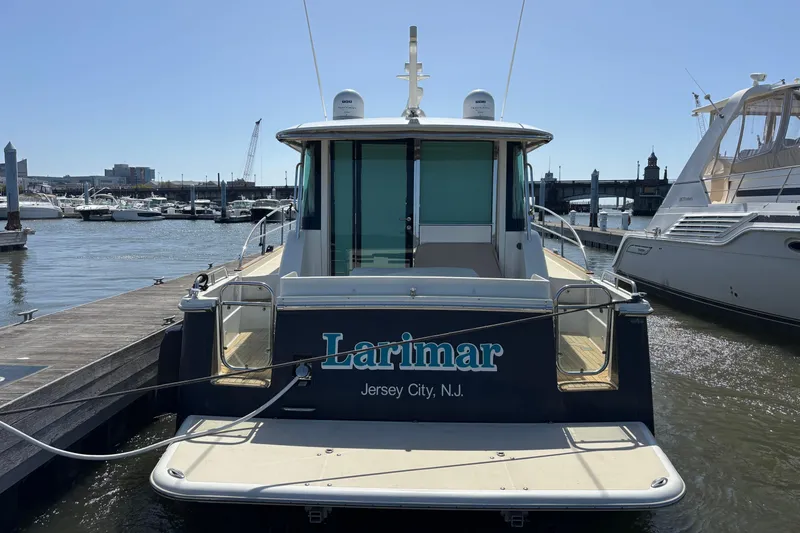 Slide: The Image of 2019 Sabre 45 Salon Express yacht docked in Jersey City marina. - 3
