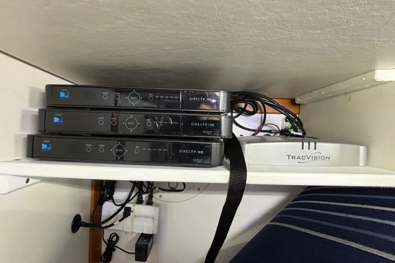 Slide: The Image of Satellite TV receivers and TracVision system on 2019 Sabre 45 Salon Express yacht. - 33