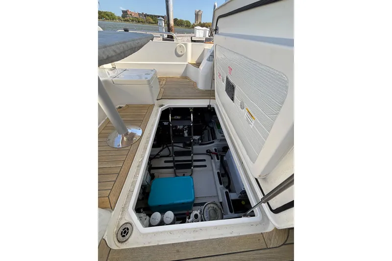 Slide: The Image of Engine compartment of 2019 Sabre 45 Salon Express yacht, showcasing interior components. - 35
