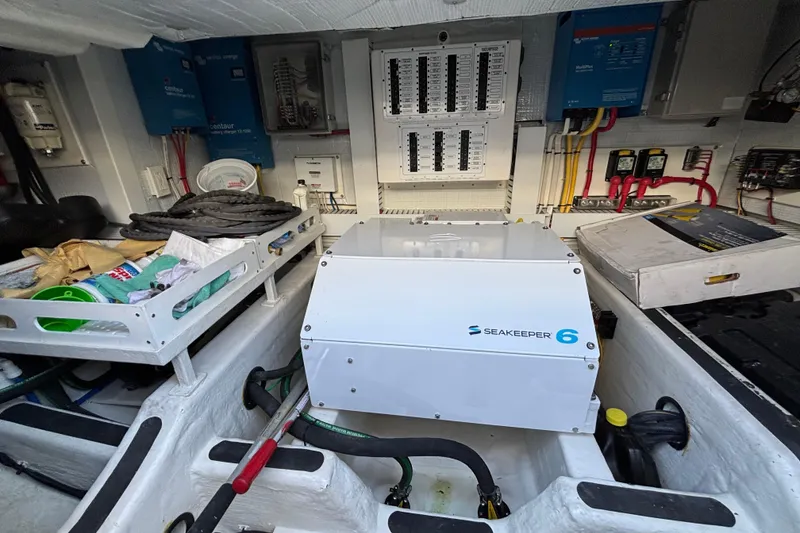 Slide: The Image of Engine room of 2019 Sabre 45 Salon Express with Seakeeper 6 stabilizer system. - 36