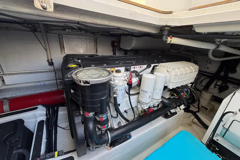 Slide: The Image of Engine compartment of a 2019 Sabre 45 Salon Express yacht, showcasing mechanical components. - 43