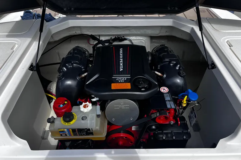 Slide: The Image of Engine compartment of 2022 Chaparral 23 SSi boat with Volvo Penta 250 V6 engine. - 19