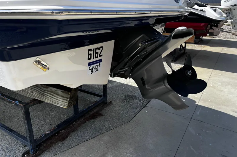 Slide: The Image of 2022 Chaparral 23 SSi boat stern with propeller and registration number. - 6