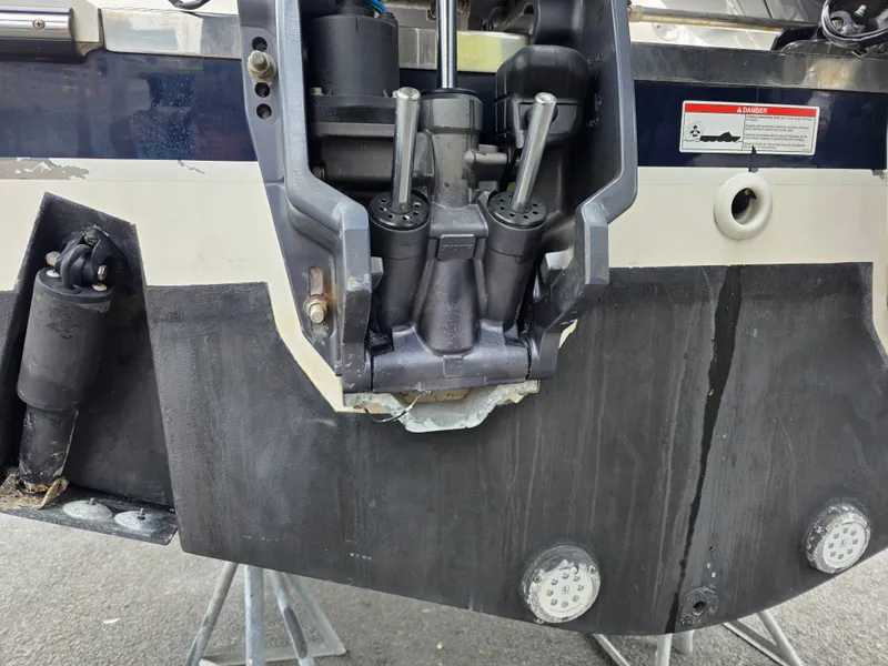 Slide: The Image of Close-up of the stern of a Pursuit DC 265 Dual Console boat with motor mount. - 29