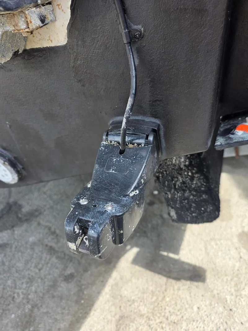 Slide: The Image of Close-up of a boat sensor on a 2017 Pursuit DC 265 Dual Console. - 7