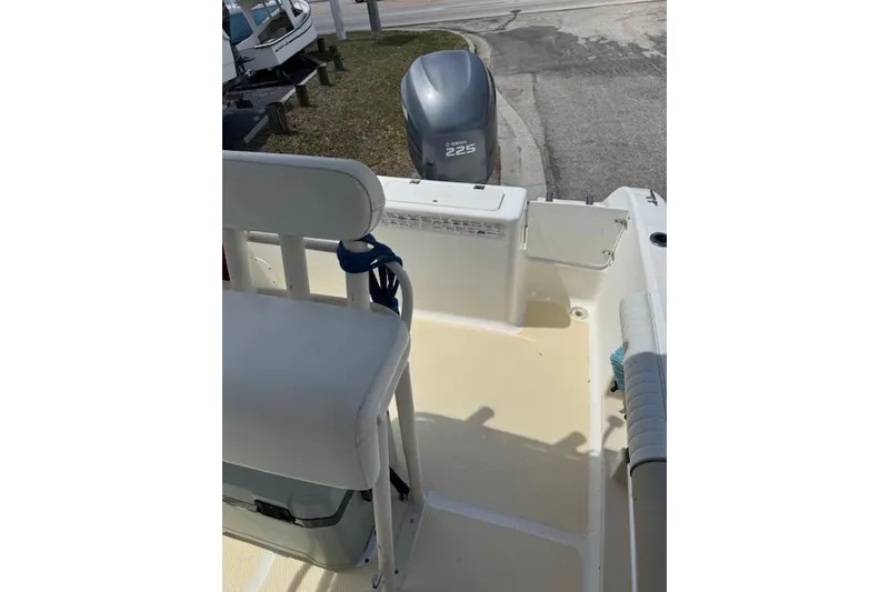 Slide: The Image of 2003 Sea Fox 230 Center Console boat interior with Yamaha 225 engine. - 12