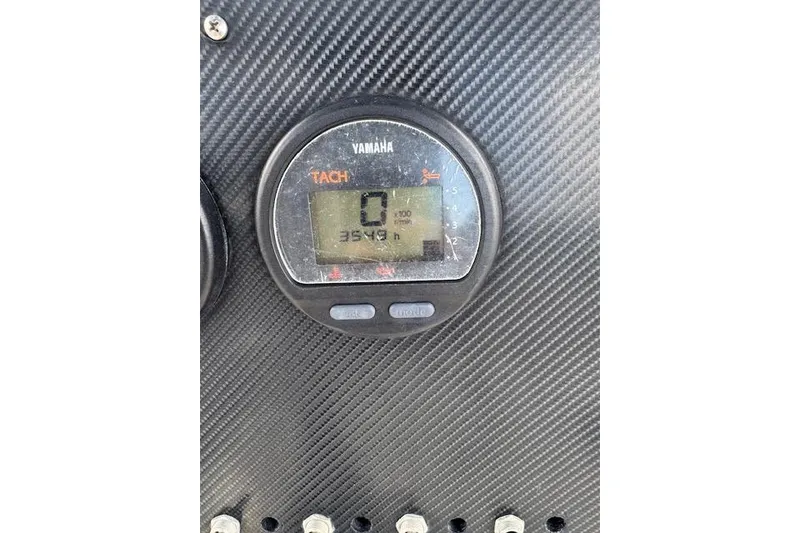 Slide: The Image of Yamaha tachometer on 2003 Sea Fox 230 Center Console, displaying 3549 hours. - 14