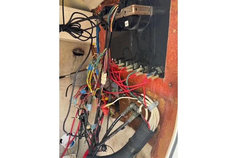 Slide: The Image of Wiring and electrical components inside a 2003 Sea Fox 230 Center Console boat. - 20