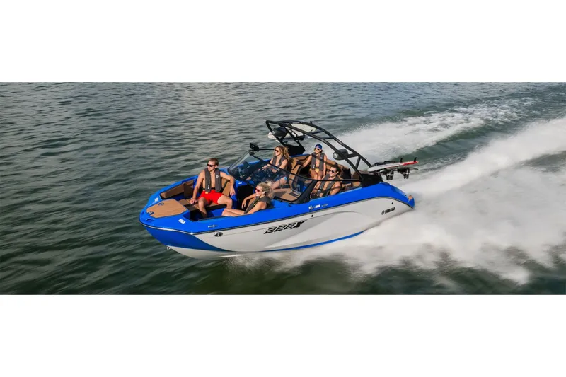 Slide: The Image of 2025 Yamaha Boats 222XE on water with passengers. - 8