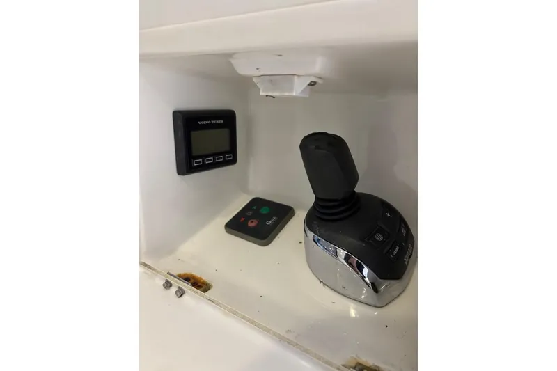 Slide: The Image of Control panel of a 2014 Beneteau Gran Turismo 49 yacht with joystick and display. - 11