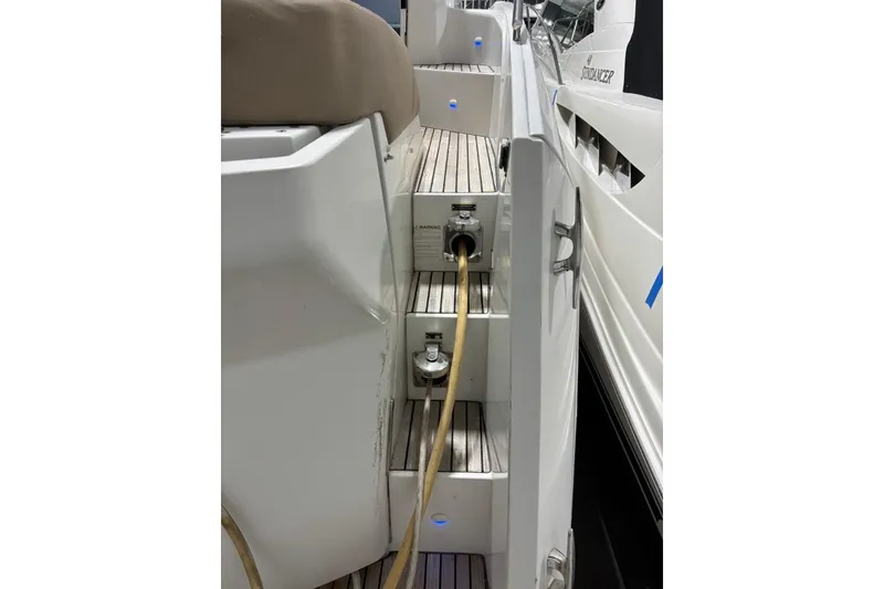 Slide: The Image of 2014 Beneteau Gran Turismo 49 yacht with dockside power connection. - 15