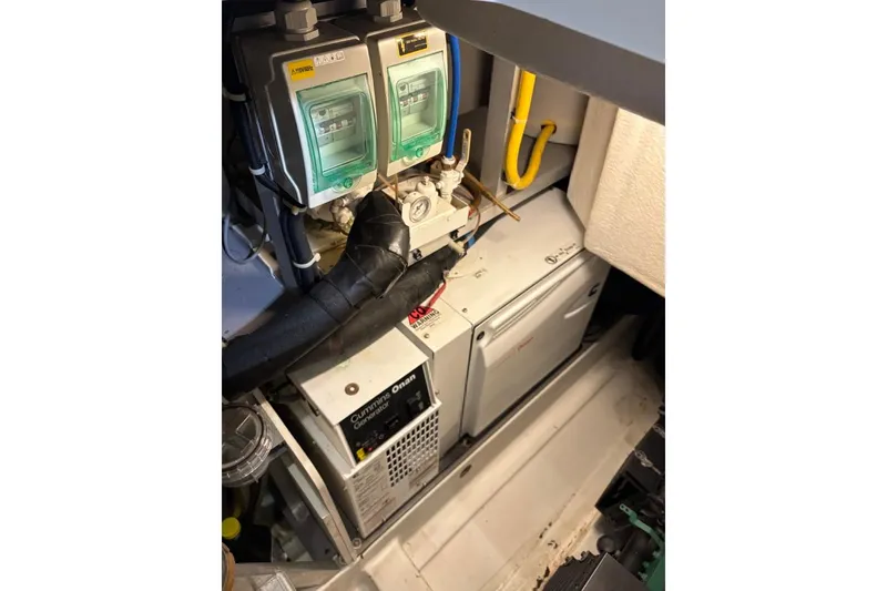 Slide: The Image of Engine room of 2014 Beneteau Gran Turismo 49 with Cummins Onan generator. - 16