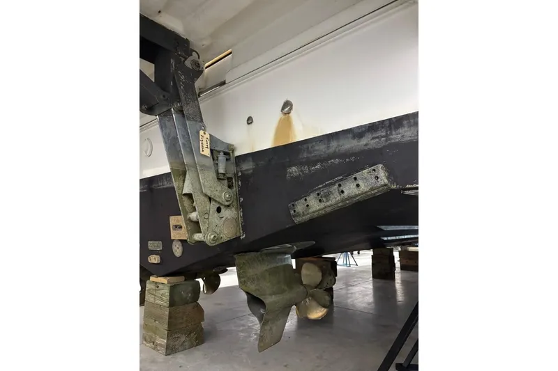 Slide: The Image of 2014 Beneteau Gran Turismo 49 boat hull and propeller detail in dry dock. - 29