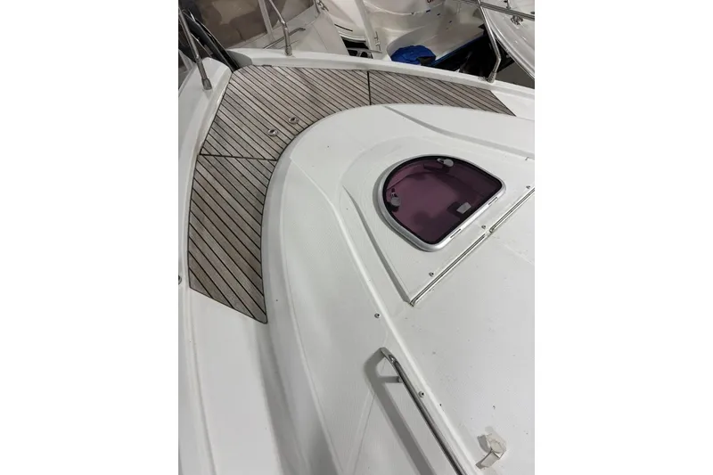 Slide: The Image of 2014 Beneteau Gran Turismo 49 yacht deck with hatch and wood paneling. - 35