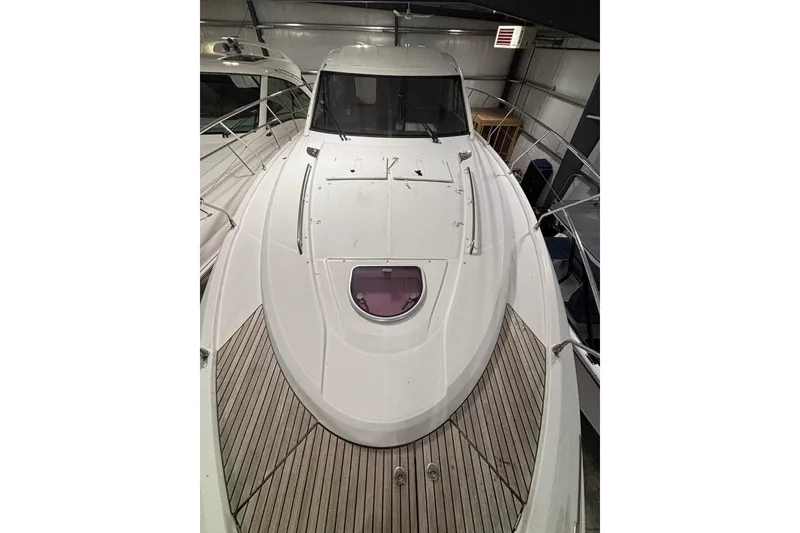 Slide: The Image of 2014 Beneteau Gran Turismo 49 yacht in storage, showcasing sleek deck design. - 37