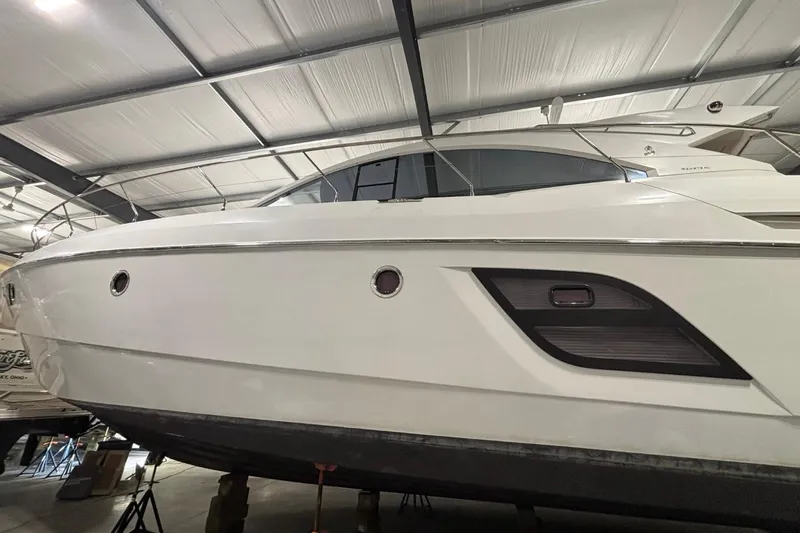 Slide: The Image of 2014 Beneteau Gran Turismo 49 yacht in storage, showcasing sleek design and modern features. - 40