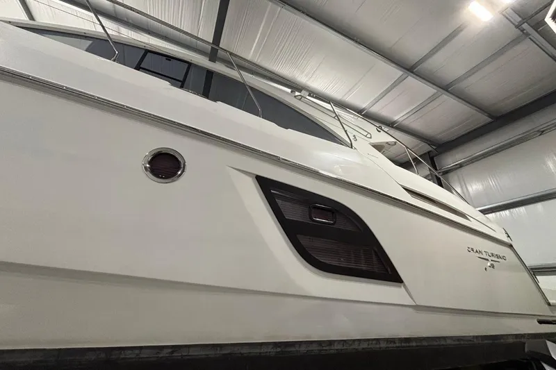 Slide: The Image of 2014 Beneteau Gran Turismo 49 yacht in storage, showcasing sleek design and modern features. - 41