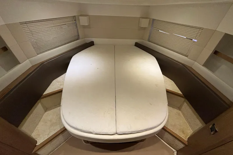 Slide: The Image of Interior cabin of 2014 Beneteau Gran Turismo 49 yacht with a spacious bed. - 43