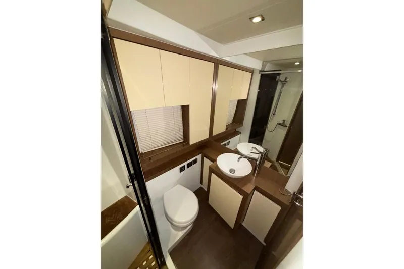 Slide: The Image of Luxurious bathroom in 2014 Beneteau Gran Turismo 49 yacht with modern fixtures. - 46