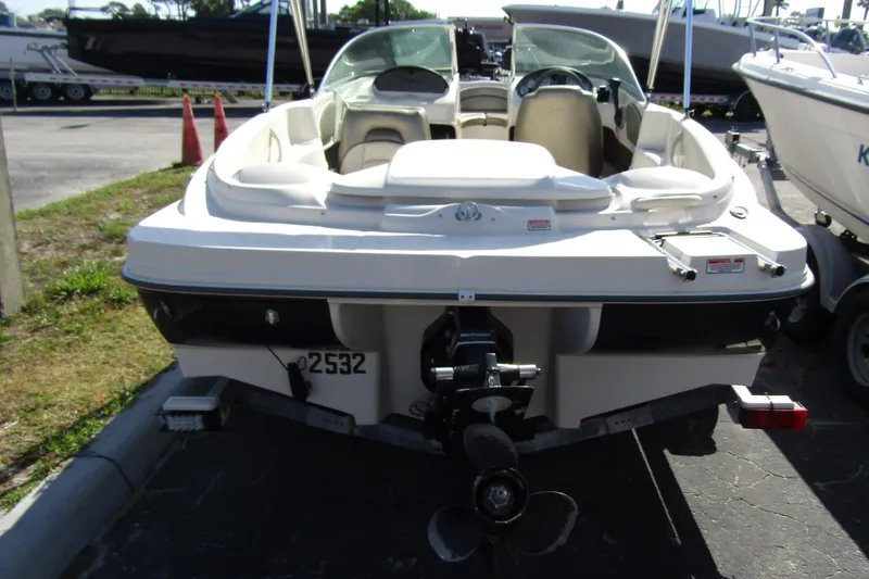 Slide: The Image of 2004 Sea Ray 180 Sport boat, rear view, parked on a trailer. - 2