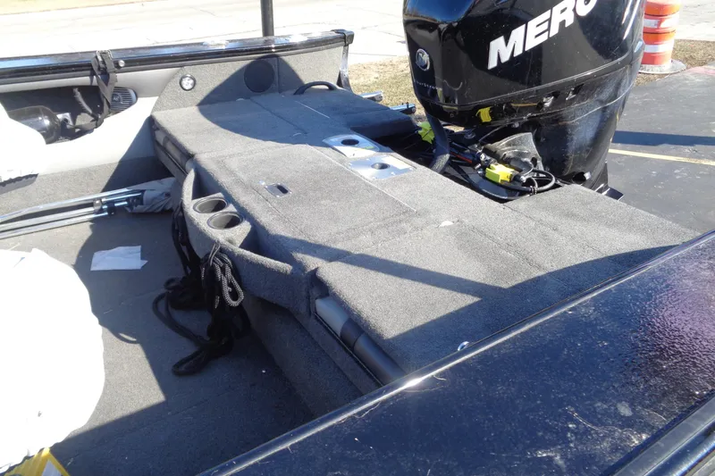 Slide: The Image of 2014 Lund 1875 Crossover XS boat interior with Mercury outboard motor. - 5