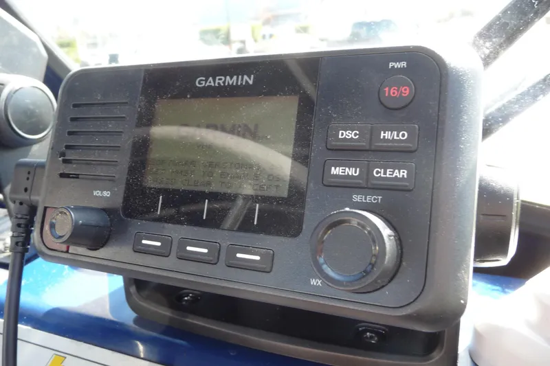 Slide: The Image of Garmin marine radio on 2013 Thunder Jet 21 Luxor OB boat dashboard. - 13
