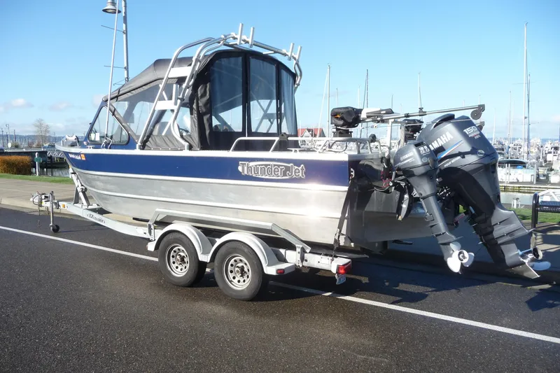 Slide: The Image of 2013 Thunder Jet 21 Luxor OB boat on trailer with Yamaha outboard motor. - 3