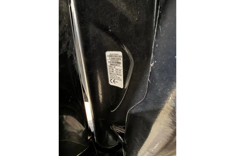 Slide: The Image of Label on 2021 Harris Cruiser 210 boat, displaying model and specifications. - 19