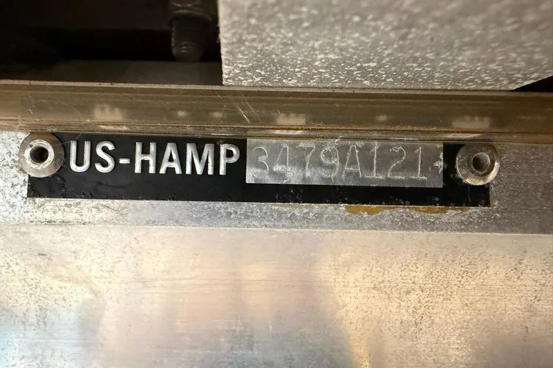 Slide: The Image of HIN plate on 2021 Harris Cruiser 210 boat, displaying serial number. - 20