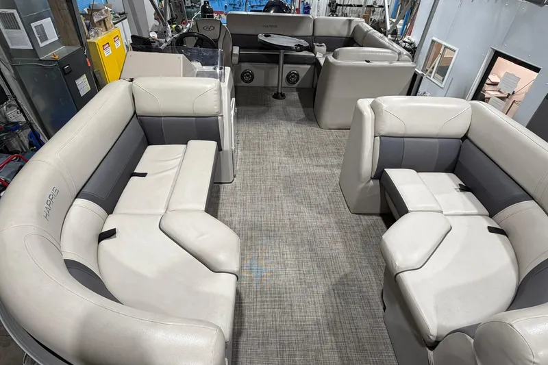 Slide: The Image of 2021 Harris Cruiser 210 pontoon boat interior with spacious seating and modern design. - 4