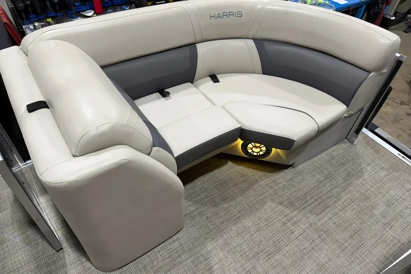 Slide: The Image of Luxurious seating on a 2021 Harris Cruiser 210 pontoon boat with ambient lighting. - 6