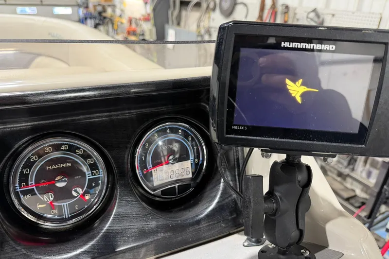 Slide: The Image of Dashboard of a 2021 Harris Cruiser 210 with Humminbird Helix 5 display. - 8