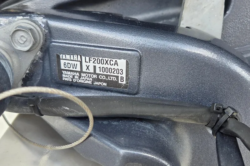 Slide: The Image of Yamaha motor label on a 2014 Jupiter 26 FS boat engine. - 26