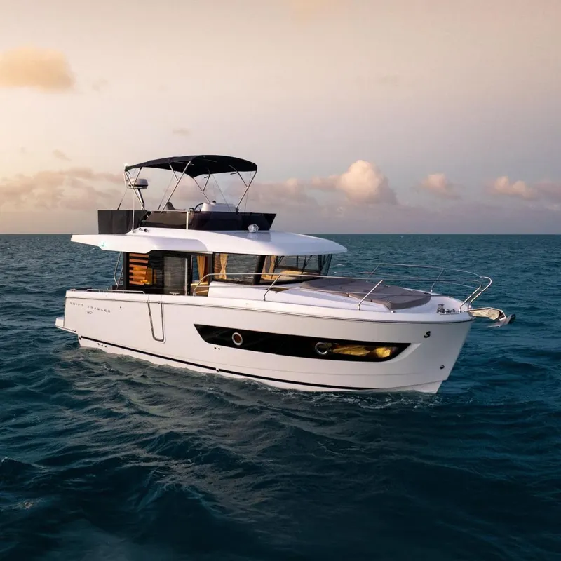 The Image of Beneteau Swift Trawler 37 Fly 2026 on open sea at sunset. - 0