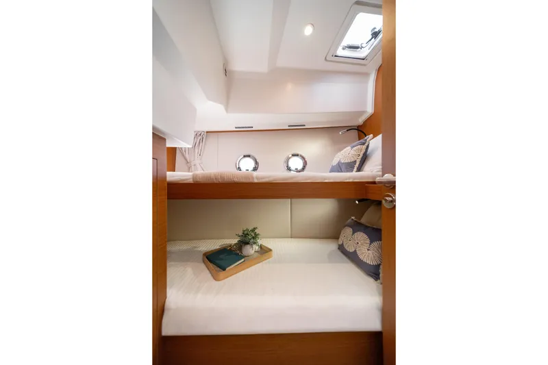 Slide: The Image of Luxurious bathroom in 2026 Beneteau Swift Trawler 37 Fly yacht, featuring modern fixtures and wood accents. - 15