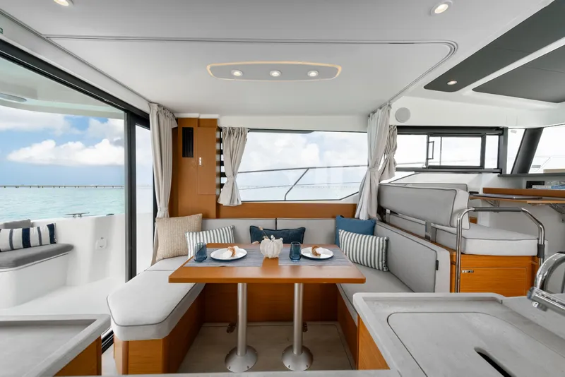 Slide: The Image of 2026 Beneteau Swift Trawler 37 Fly helm with advanced navigation controls and displays. - 9